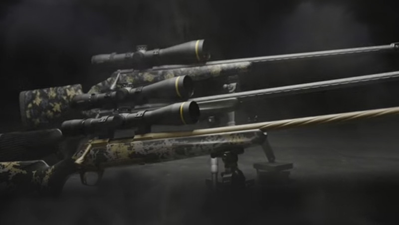 Three bolt-action rifles with attached scope in a dark background