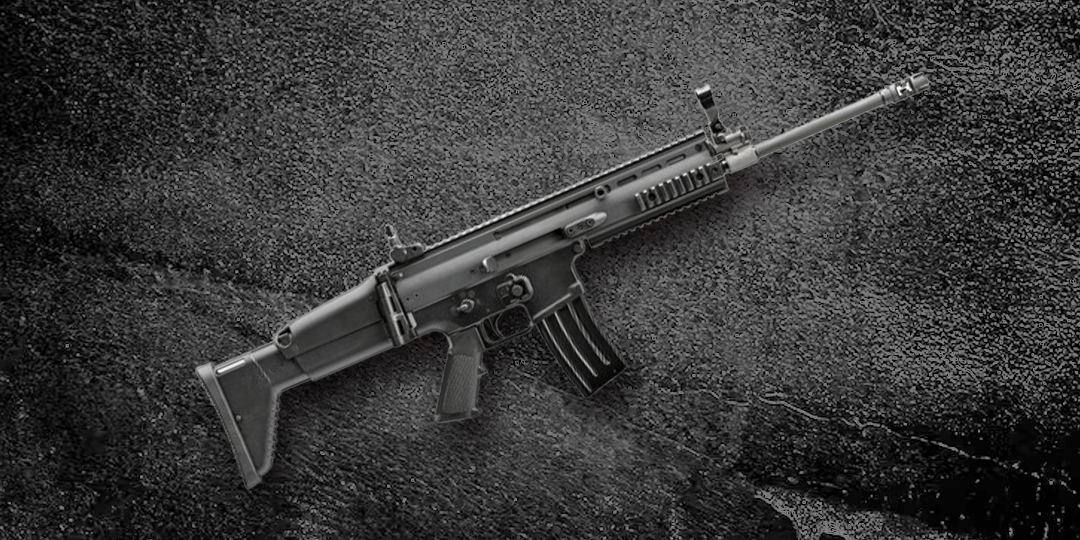 A black FN Herstal rifle on a dark background