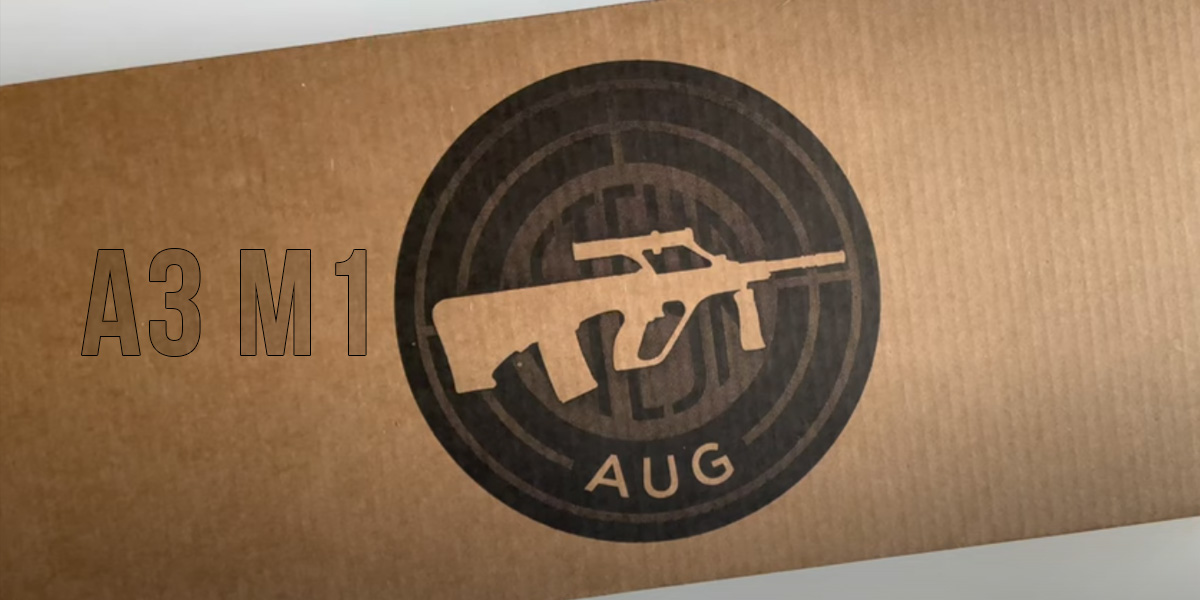 A box featuring the logo of an AUG A3 M1 gun, showcasing its branding and design elements prominently